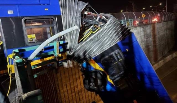 MTA articulated bus dangles off an overpass 2