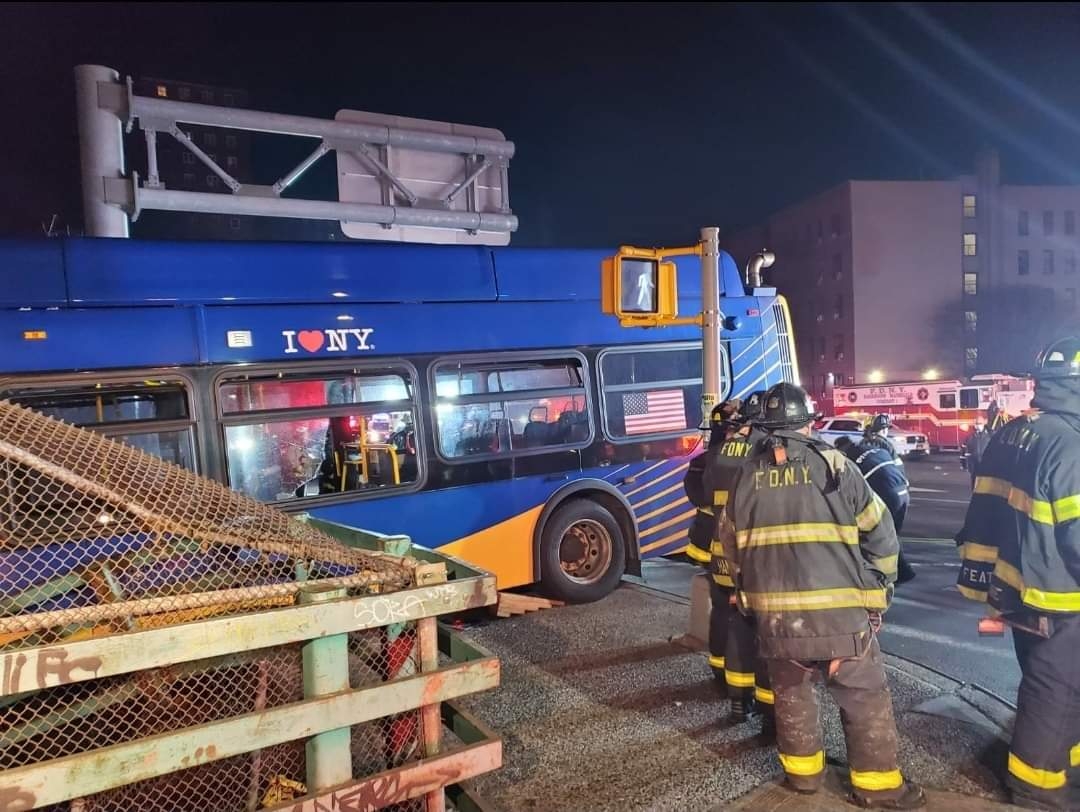 MTA articulated bus dangles off an overpass 1