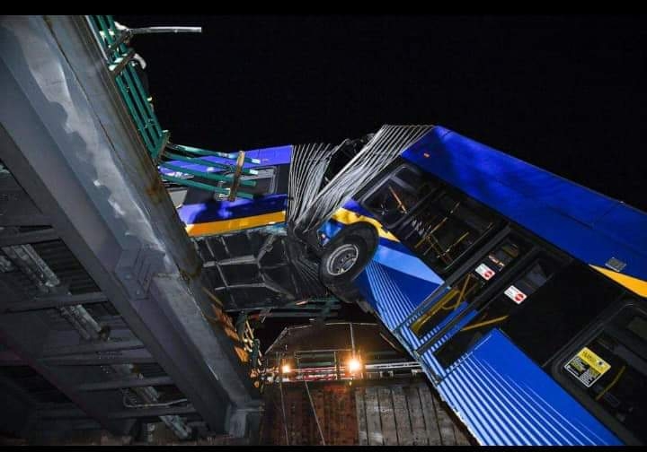 MTA articulated bus dangles off an overpass 3