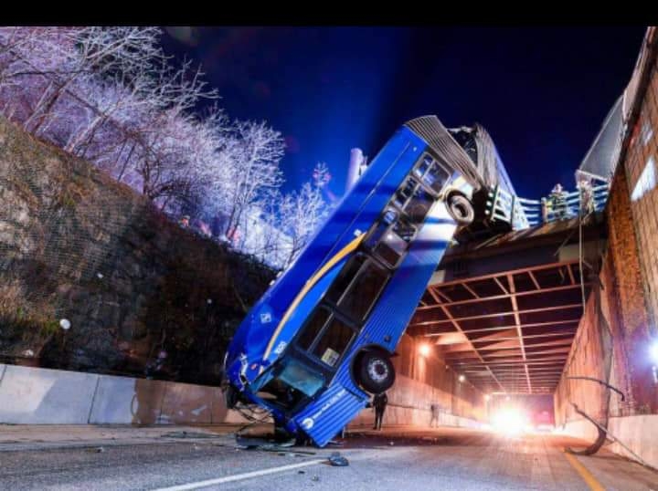 MTA articulated bus dangles off an overpass 4