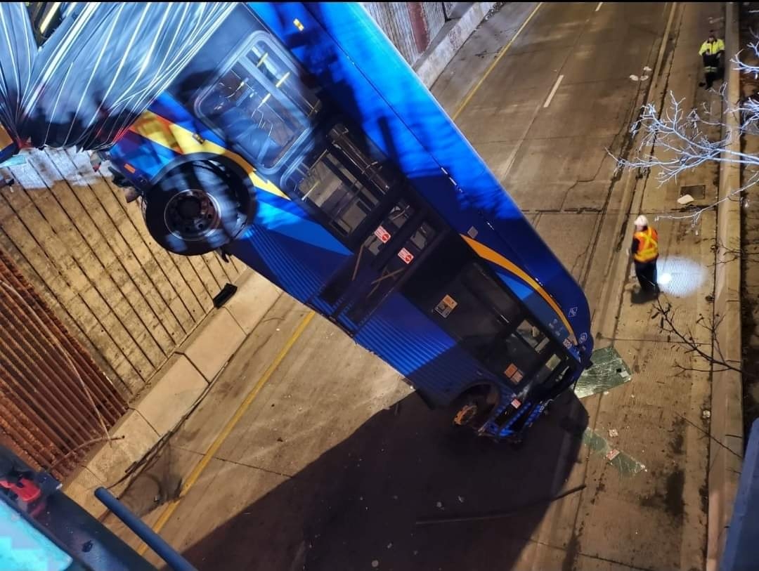 MTA articulated bus dangles off an overpass 5